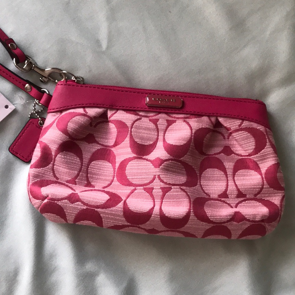 Pink coach wristlet